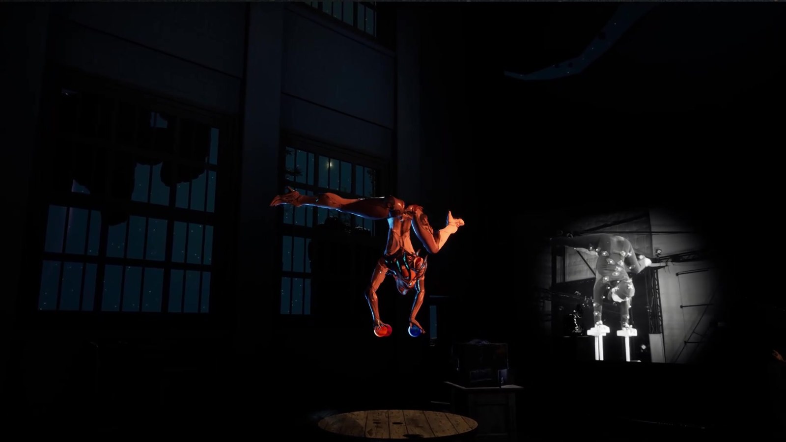 Another moment of the same character — a one-arm acrobatic pose on the balance balls, with the live performer visible to the right of frame doing the exact same pose, MoCap tracking markers visible on her suit. The real-time mapping from live performer to virtual character is the entire point of the show.