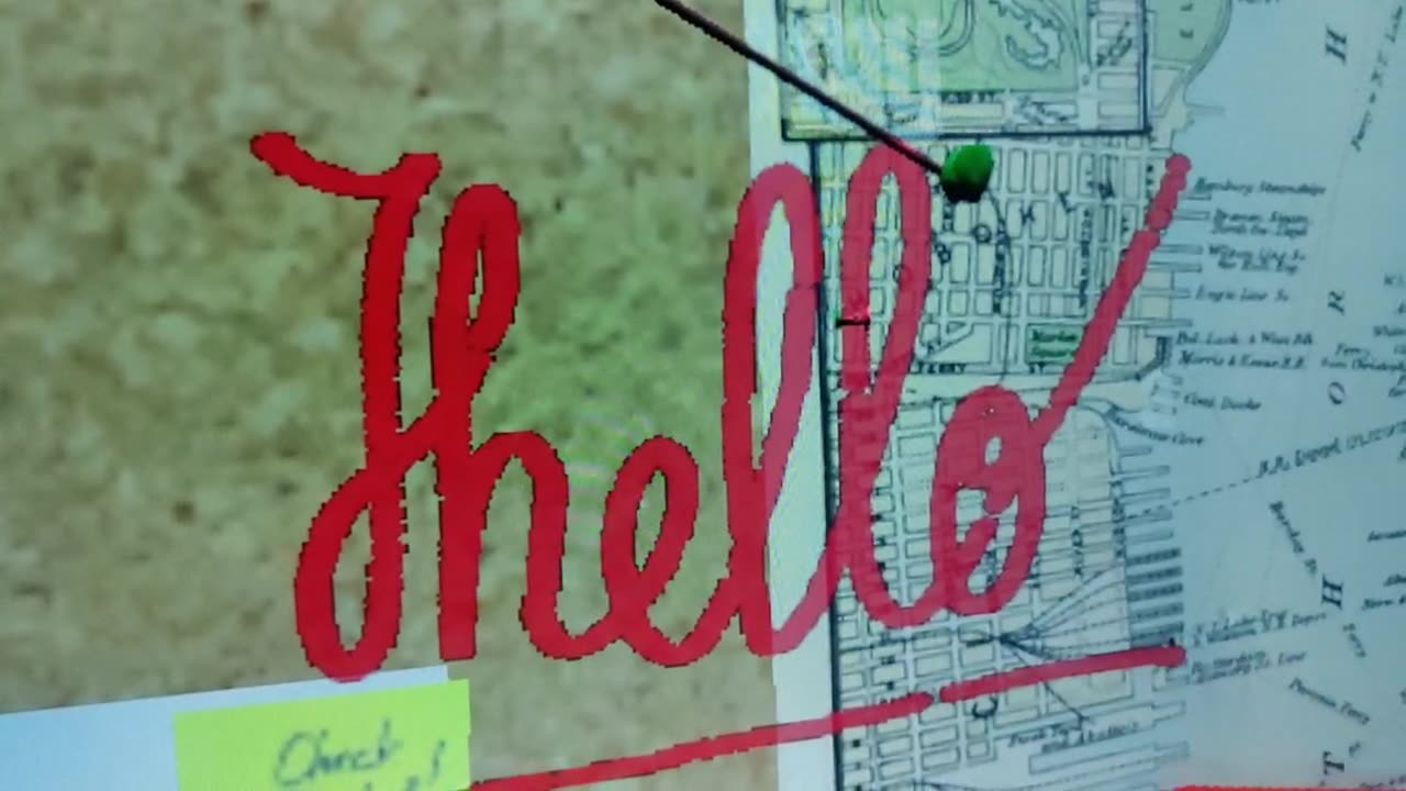 Magic Marker drawing live on a virtual cork board in the hacker server-room set — video placeholder